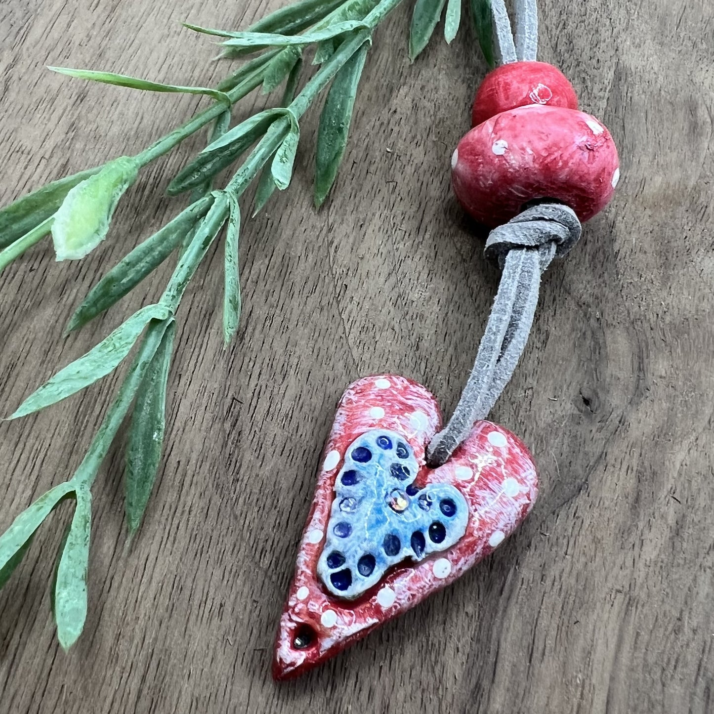 Joyful Affection | Pink Heart Pendant Polymer Clay Necklace with Blue Heart Accent