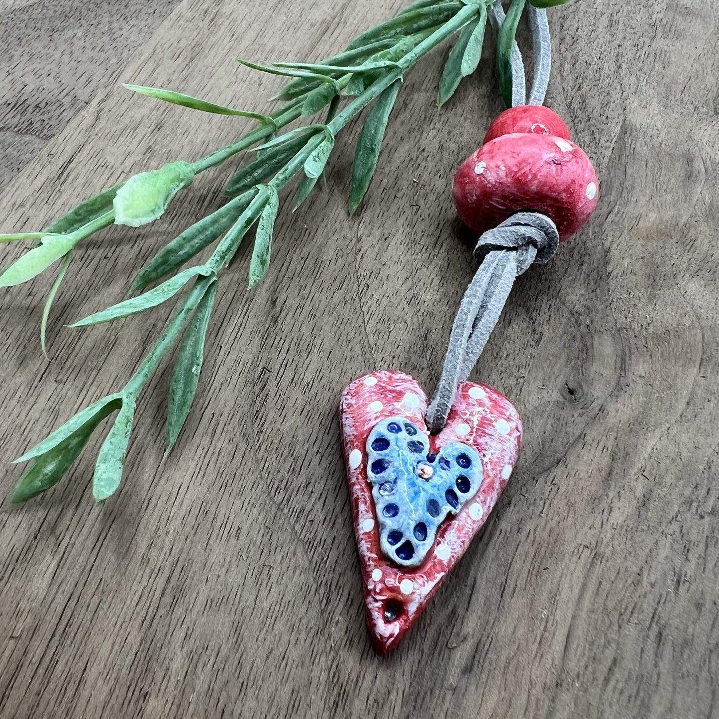 Joyful Affection | Pink Heart Pendant Polymer Clay Necklace with Blue Heart Accent