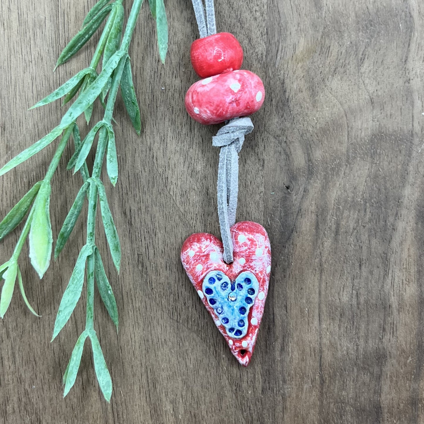 Joyful Affection | Pink Heart Pendant Polymer Clay Necklace with Blue Heart Accent