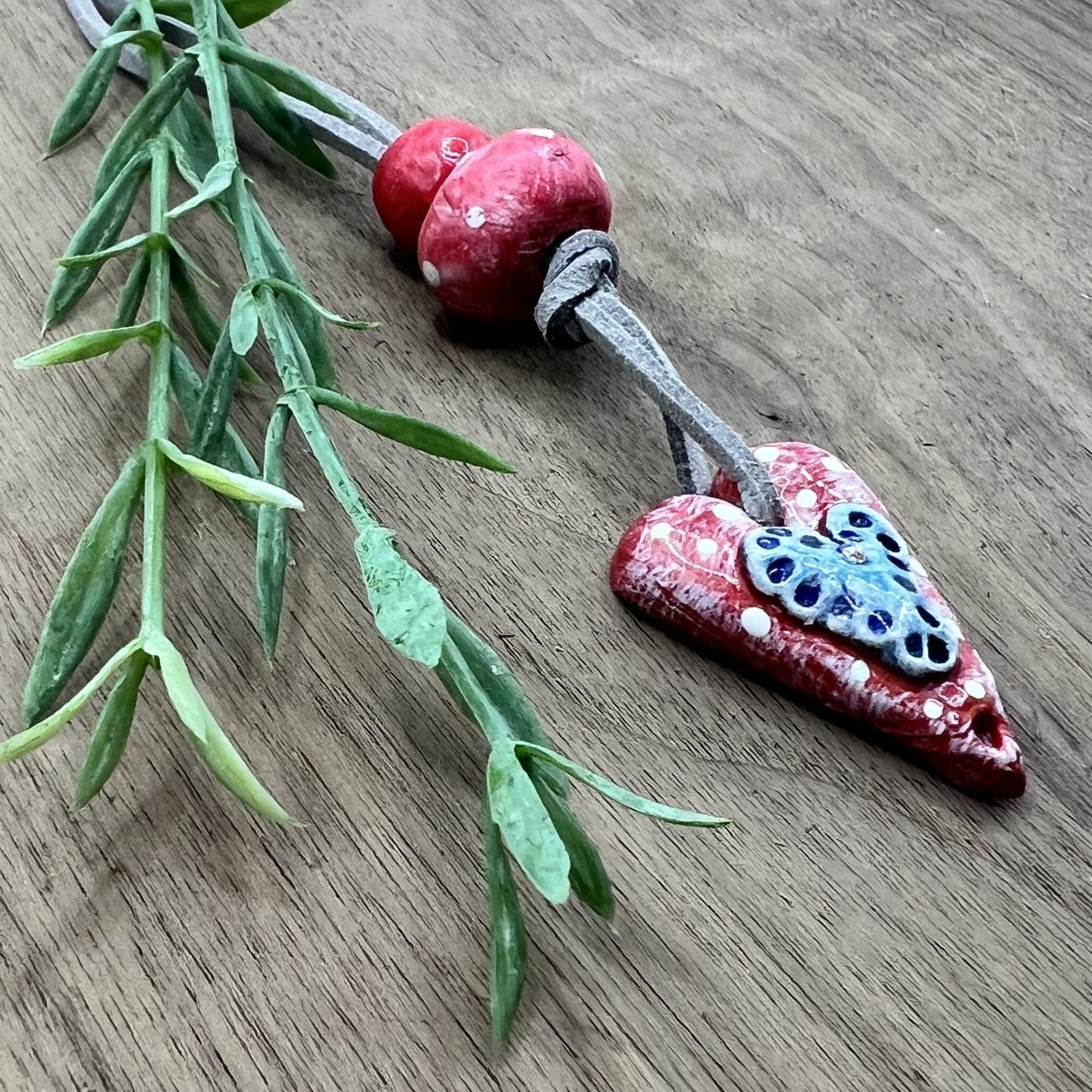 Joyful Affection | Pink Heart Pendant Polymer Clay Necklace with Blue Heart Accent