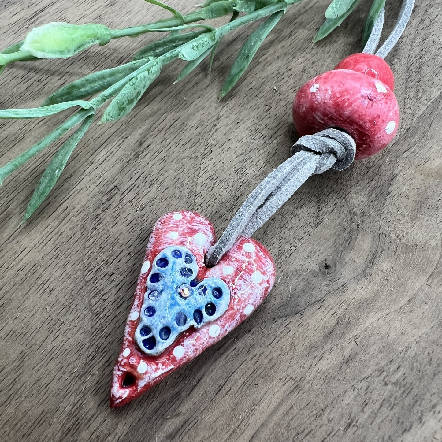 Joyful Affection | Pink Heart Pendant Polymer Clay Necklace with Blue Heart Accent