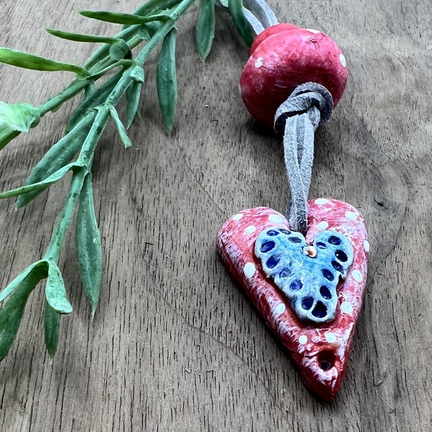 Joyful Affection | Pink Heart Pendant Polymer Clay Necklace with Blue Heart Accent