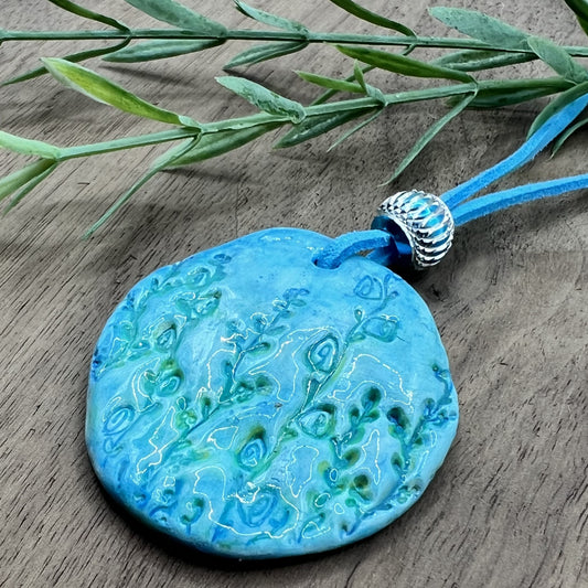 Tranquil Oasis | Handcrafted Teal Oval Polymer Clay Necklace Pendant