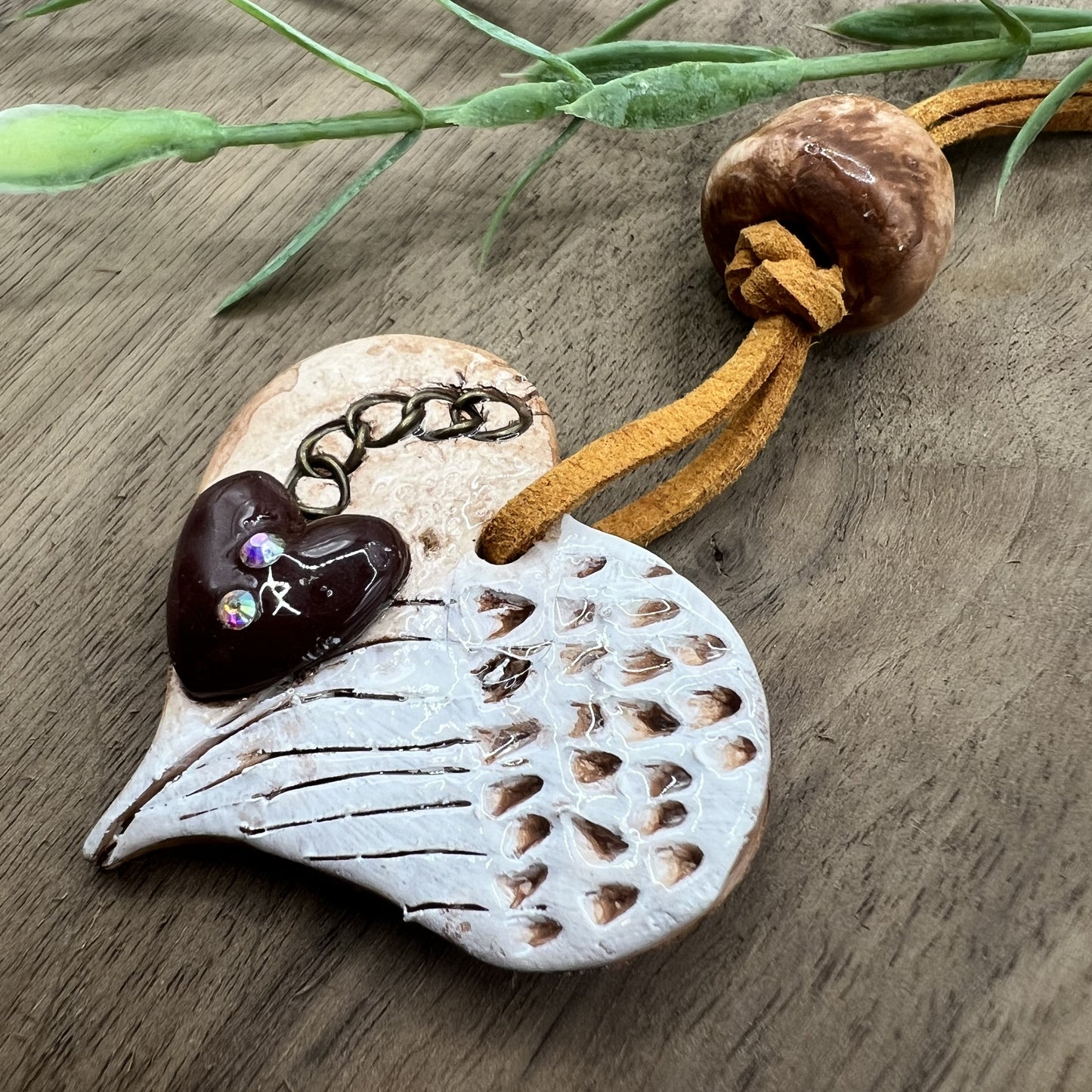 Wings of Devotion | Brown Heart-Shaped Polymer Clay Necklace with White Angel Wings Accent