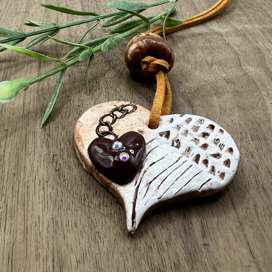 Wings of Devotion | Brown Heart-Shaped Polymer Clay Necklace with White Angel Wings Accent