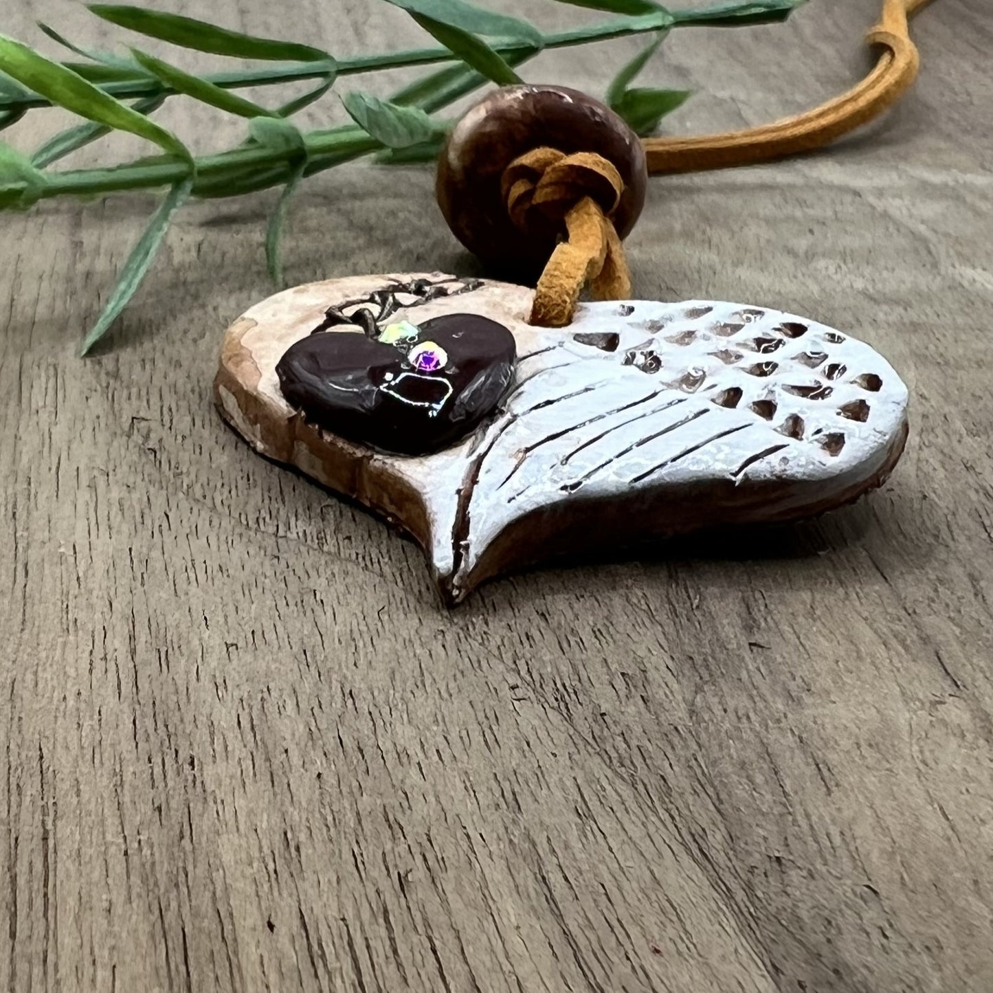 Wings of Devotion | Brown Heart-Shaped Polymer Clay Necklace with White Angel Wings Accent