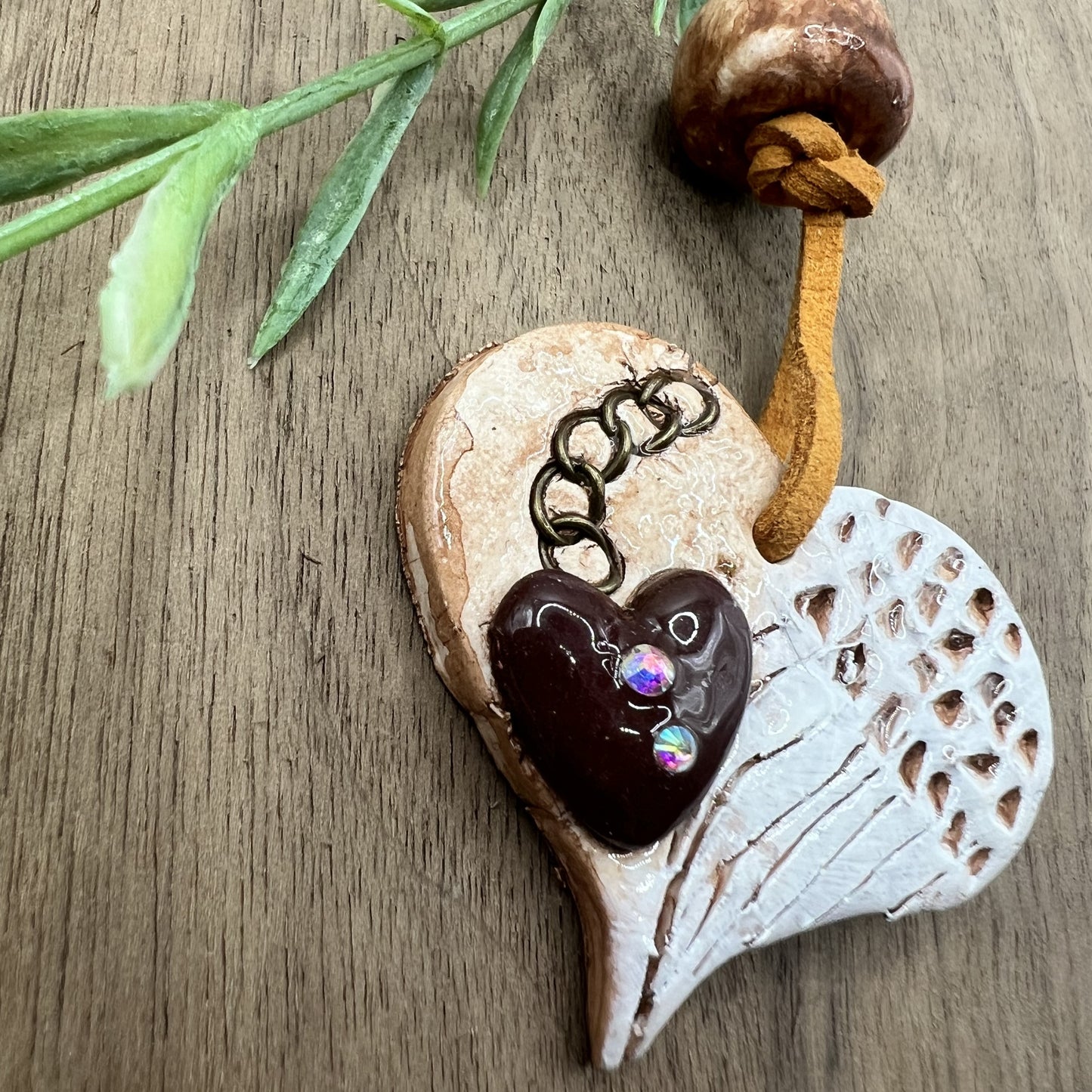 Wings of Devotion | Brown Heart-Shaped Polymer Clay Necklace with White Angel Wings Accent